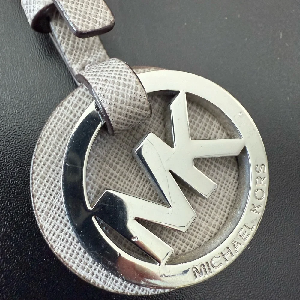 Michael Kors Silver MK Circle Logo Tag with Taupe Textured Strap